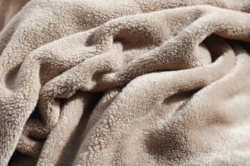 Ultra-soft, plush cream faux fur fabric, ideal for cozy textures, comfortable blankets, wallpaper, lifestyle design, and luxurious backgrounds. © Ink N Propeller