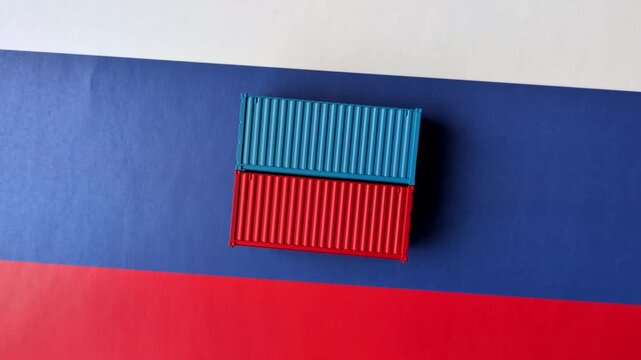 Containers on the russian flag as a backdrop and concept for embargoes and export bans. The russian export ban as a backdrop for your design