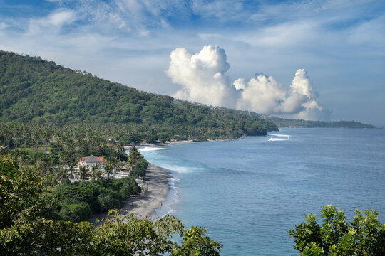 Beautiful view with a dramatic sky over the expansive beach in Senggigi, West Lombok, West Nusa Tenggara (NTB), Indonesia.