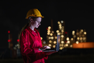 Engineers&rsquo; night shift working oil and gas refinery service, Workers hard work at night petroleum industry plant background.