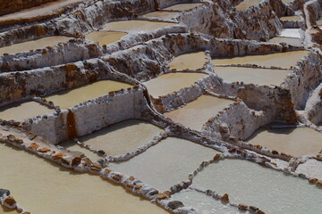 A close-up photo of salt-mining pools in Maras, Cusco Province, Peru.