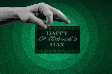 St. Patrick's Day calendar, March 17. Halftone collage: a hand holding a St. Patrick's Day greeting card. A symbol of good luck and success.