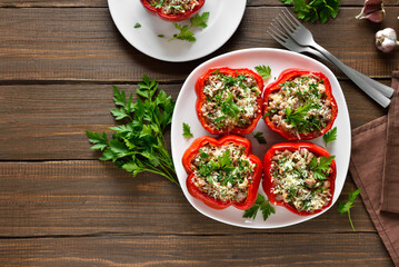 Stuffed red peppers with minced meat, rice, parmesan cheese