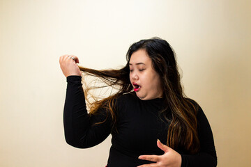 Young Woman Playing with Long Hair and Lollipop, Funny Face Expression
