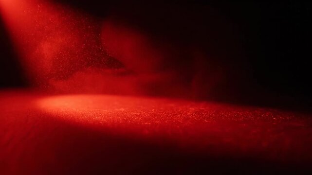 Dramatic red spotlight on foggy background for abstract visuals