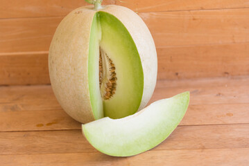 piece of fresh white melon on the plate  