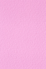 blank sheet of  textured paper colored in pink