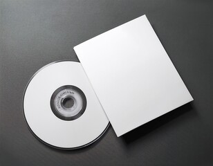 white blank card and white cd or dvd on a grey background with s mockup