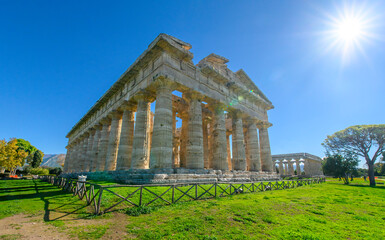 Fototapeta premium The ancient Greek temple of Hera in Paestum, Italy. Famous archaeological site of Paestum, Magna Graecia, ancient ruins.