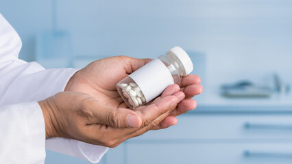 doctor holding pills