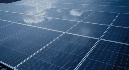 Close-up View of Solar Panels on a Rooftop with Reflection of Clouds in Blue Sky