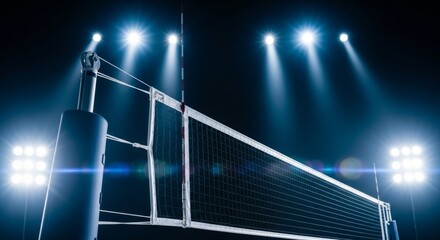 Indoor volleyball court with net and stadium lights