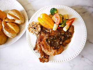 Pork chop steak with mixed vegetables