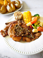 Pork chop steak with mixed vegetables