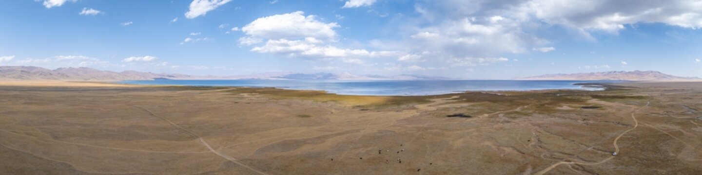 Aerial view, Vast empty landscape at the mountain lake Song Kul in autumn, Moldo Too Mountains, Naryn region, Kyrgyzstan