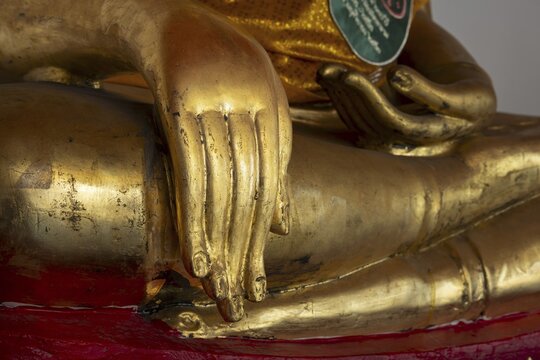 Gilded Buddha statue, Bhumispara-mudra, Buddha Gautama at the moment of enlightenment, Wat Pho, Bangkok, Thailand