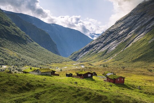 Traditional cabins with grass roofs in the mountain valley, Skjerdingsdalss&aelig;tra, Stryn, Norway