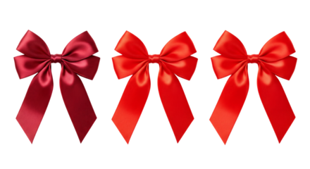 Red satin bows, tied, isolated on transparent background