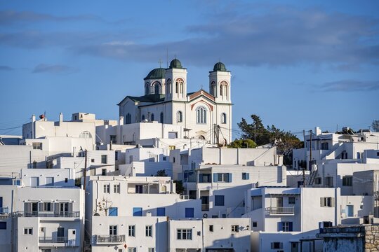 Village view of Naoussa town, white Cycladic houses and Agios Faneromeni church, Paros, Cyclades, Greece