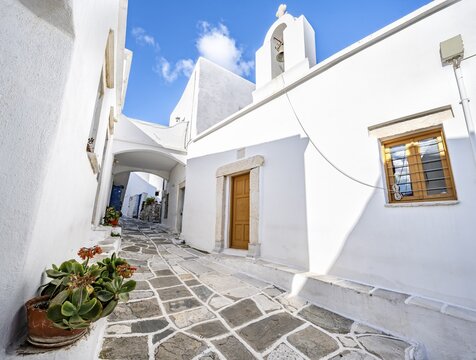 White Greek Orthodox Chapel, picturesque alleys of the village of Lefkes, Paros, Cyclades, Greece