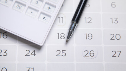 Pen on calendar. Day. Business
