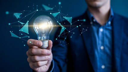 Hand Holding Glowing Light Bulb with Digital Data Network and Cyber Connections on Dark Blue Background
