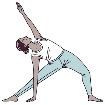 Woman performing triangle pose in yoga