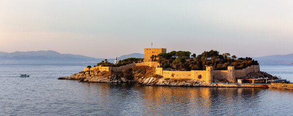 Pigeon Island with Byzantine castle at sunset, Kusadasi, Turkey © Elena