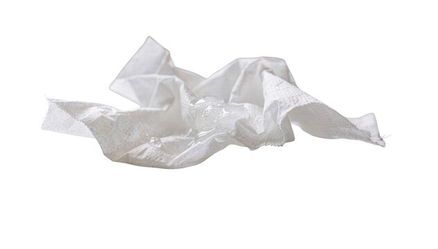 Detailed shot of a used tissue with clear l mucus on a clean bathroom counter highlighting common cold symptoms in a home environment.