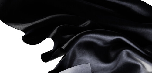 Close up shot of flowing black fabric showing texture, folds and shimmering light reflections. Perfect for backgrounds a
