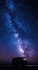 Night Sky with Stars and Milky Way Over Silhouette of Camper Van in Nature