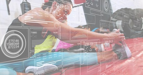 Stretching woman in bright workout clothes reaching for foot on red mat in gym, HUD overlay