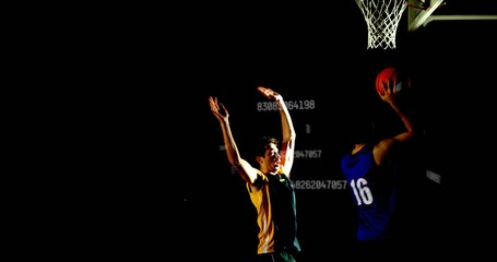 Shooting blue jersey facing yellow green defender at gym with basketball hoop spotlight 16 overlays