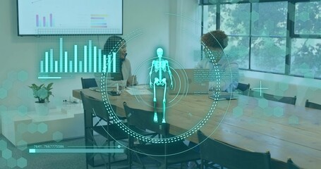 Reviewing two colleagues wearing office attire viewing holographic HUD on laptops in meeting room