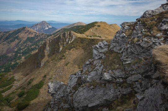 View of rugged peaks and valleys stretch under a vast sky, where stone meets sky in a dance of earth and atmosphere, Chleb, Zilina Region, Slovakia.