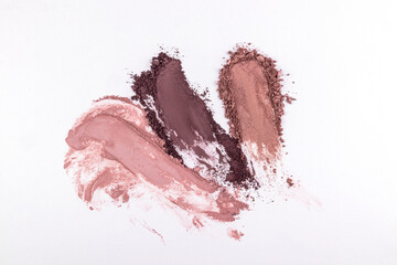 Assorted eyeshadow smears showcasing textures and colors