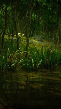Lush jungle wetland with winding path, dense canopy filtering warm light over reeds and mossy banks, narrow trail leading deeper into emerald vegetation, humid