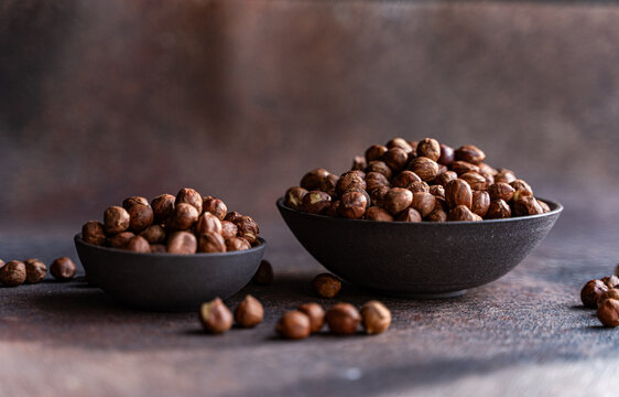 Organic hazelnuts in bowls showcasing healthy nutrition