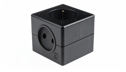 Obraz premium Black Cube Socket - Modern Power Solution for Home and Office.