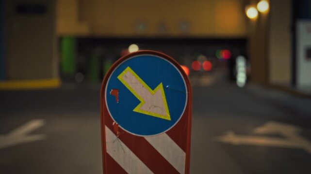 In urban areas, the Right Arrow road sign directs the movement of vehicles, promoting safe driving by complying with established traffic rules, ensuring an orderly flow of traffic in busy urban areas