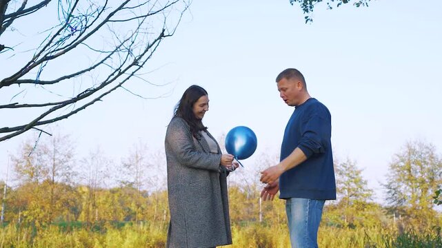 A woman tells her man she's pregnant. Parenthood, good news. A couple learns they're expecting a baby. On a date, a woman tells her boyfriend they're expecting a son, and they rejoice together.