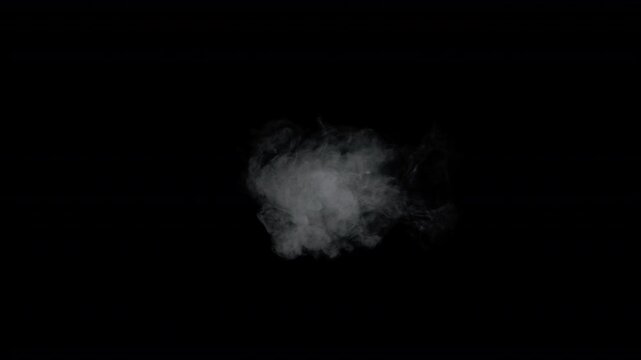 Super Slow Motion Shot of Real Smoke Spreading Towards Camera Isolated on Black at 1000fps.