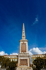 Naklejka premium Historic Torrijos Monument in Plaza de la Merced, Malaga