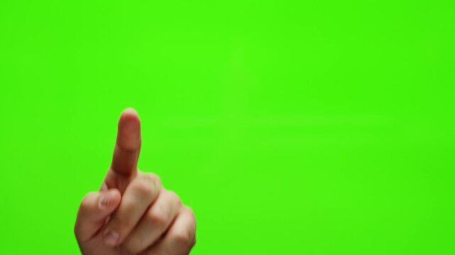 Male hand touching, making sign on document, clicking, tapping, sliding and swiping on chroma key green screen background. Different signs and gestures with fingers. 