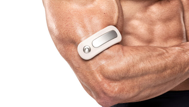 Closeup of a smart adhesive temperature patch on an athletic upper arm isolated on white highlighting sleek design and seamless skin adhesion for optimal performance monitoring.