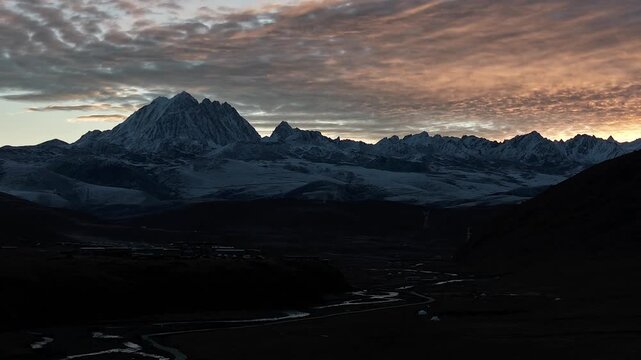 Sunrise Aerial Hyperlapse of Yala Snow Mountain in Sichuan