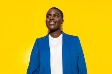 Confident black businesswoman in blue blazer