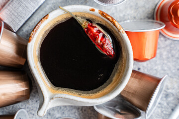 Espresso coffee with chocolate and chili pepper