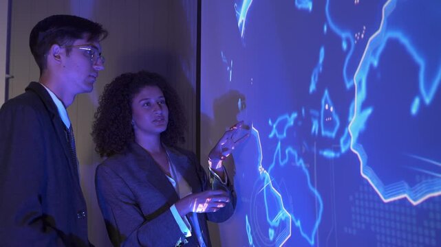 Discussion on global data and technology with interactive presentations in an office