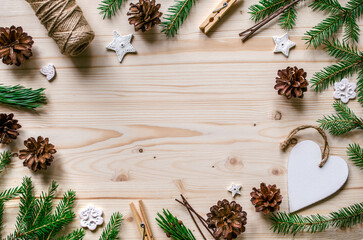Scandi Christmas flat lay with pine cones and decorations